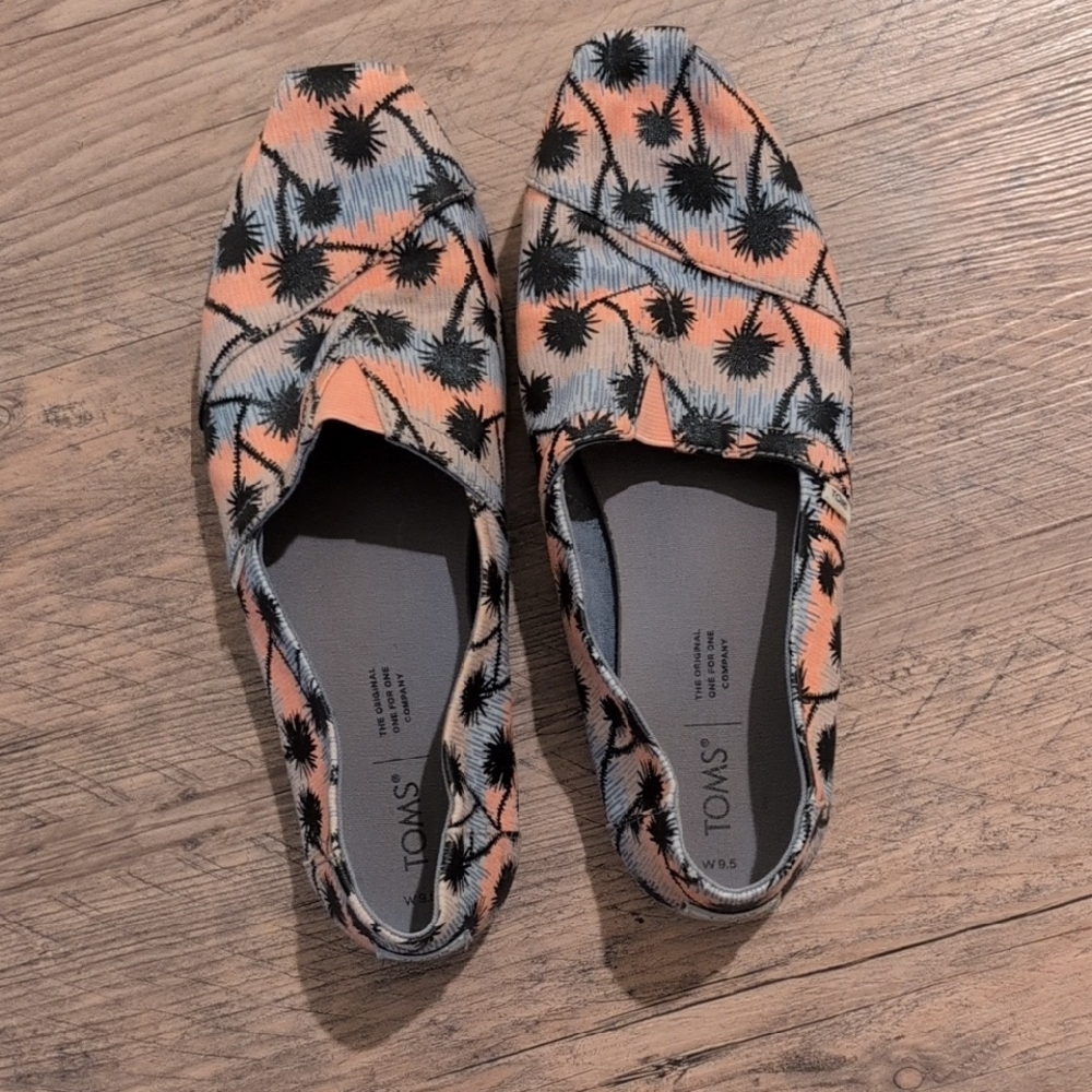 TOMS Orange and Black Patterned Slip-Ons